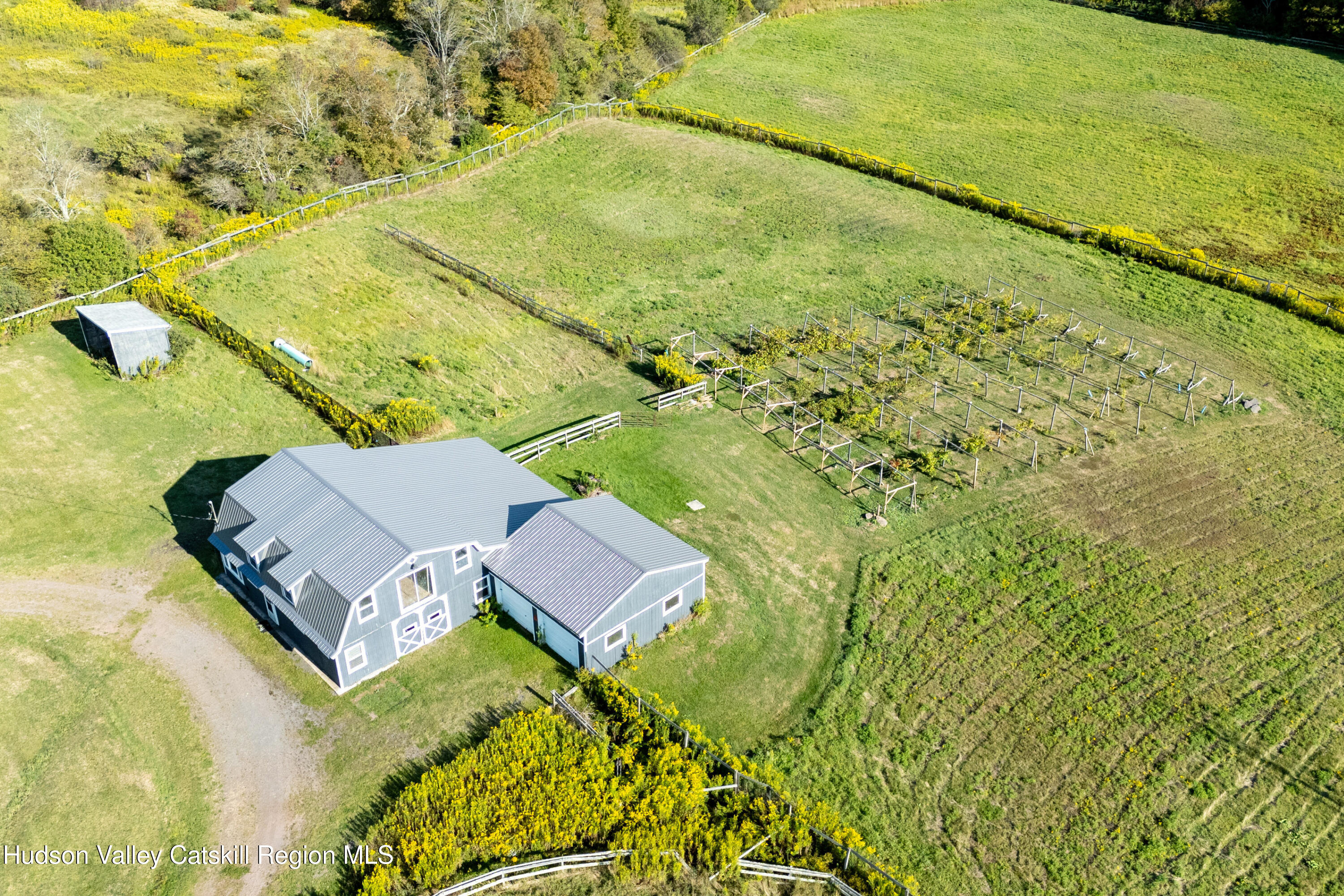 5574 County Highway Denver, NY 12421 - Photo 14 of 36 a aerial view of residential houses with swimming pool