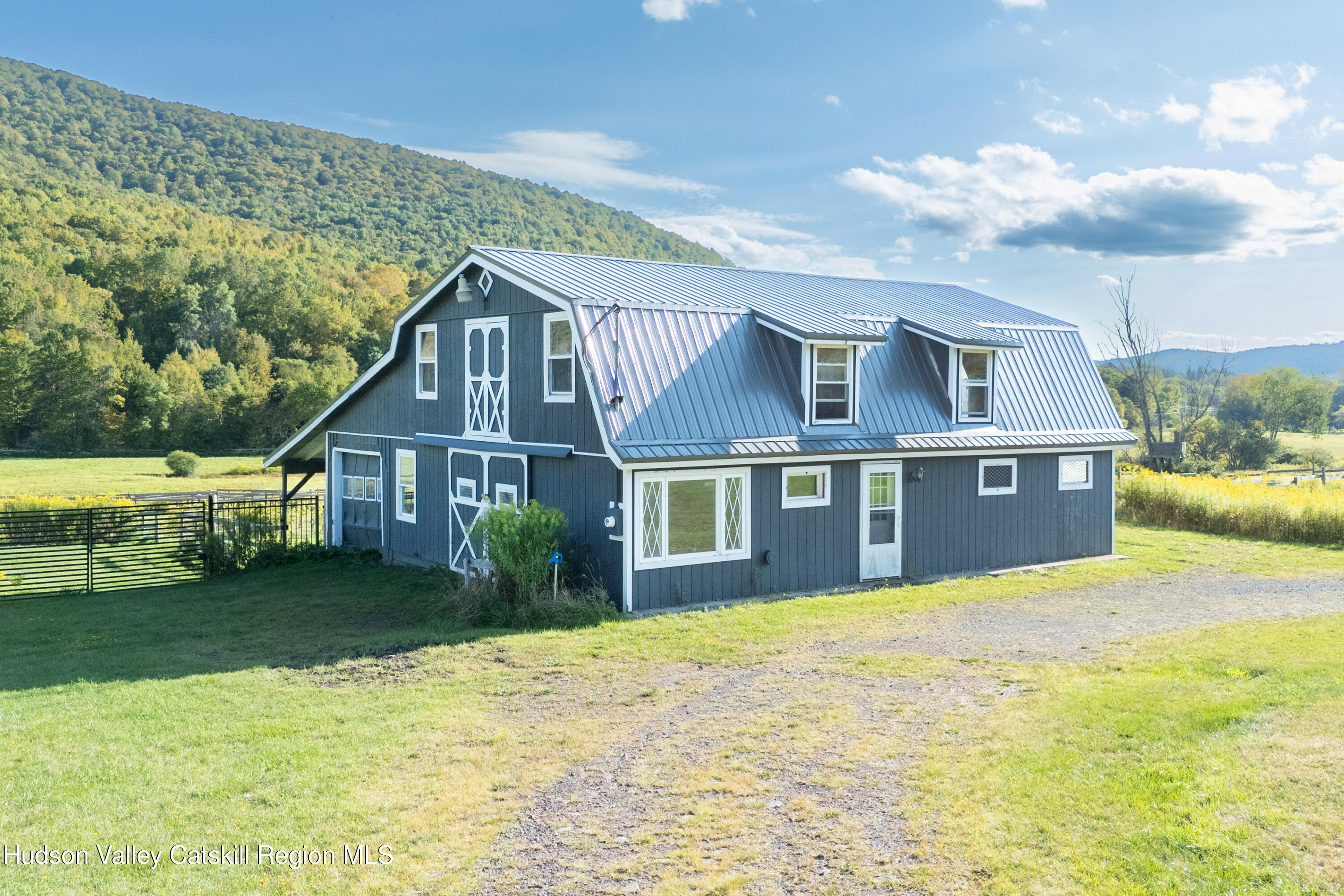 5574 County Highway Denver, NY 12421 - Photo 3 of 36 a front view of a house with a yard