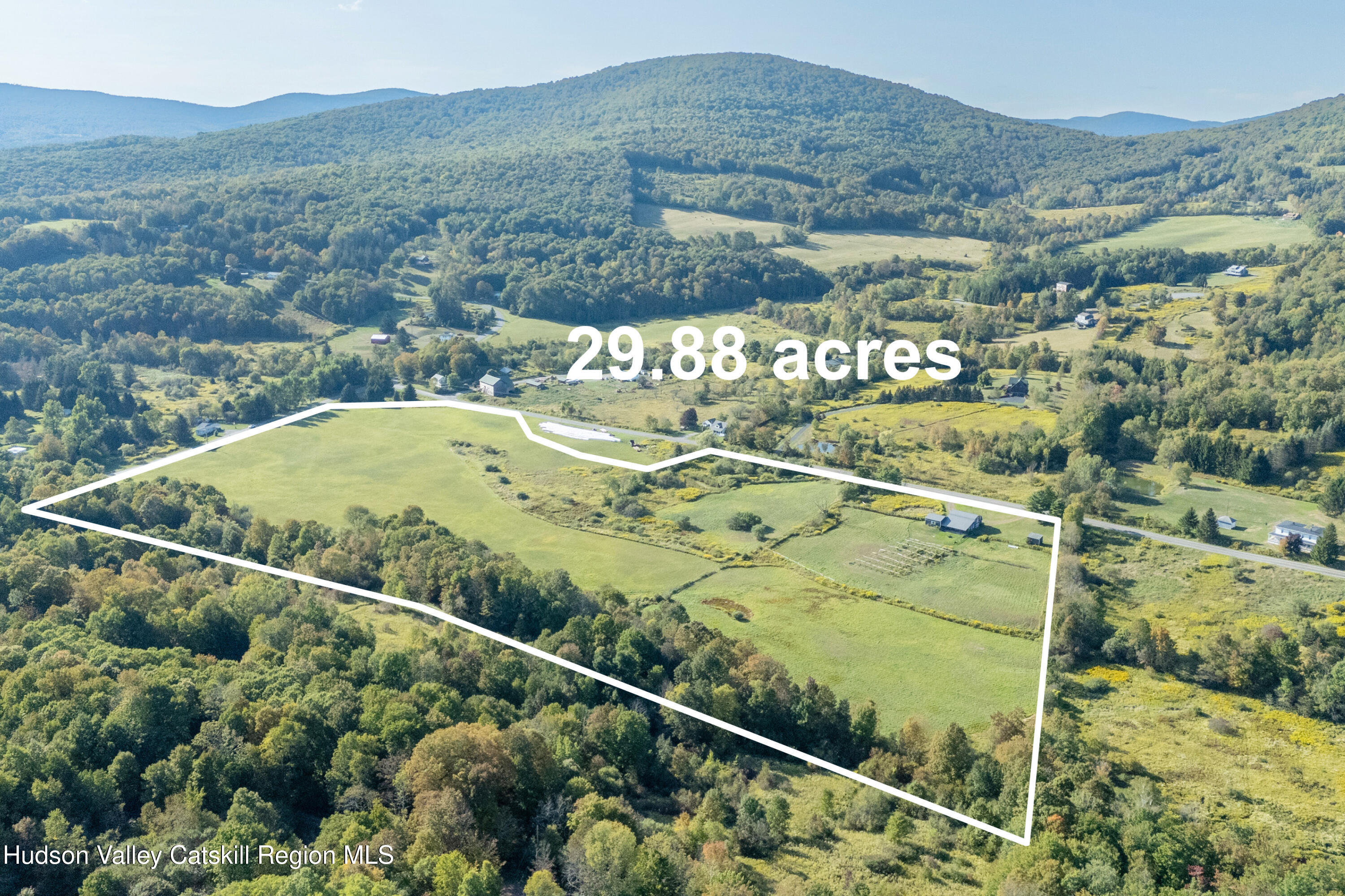 5574 County Highway Denver, NY 12421 - Photo 33 of 36 a view of a swimming pool with a yard and mountain view