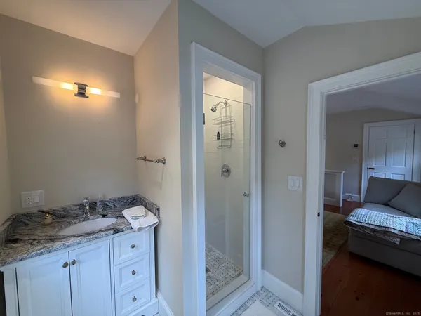 a view of bathroom with dual sinks