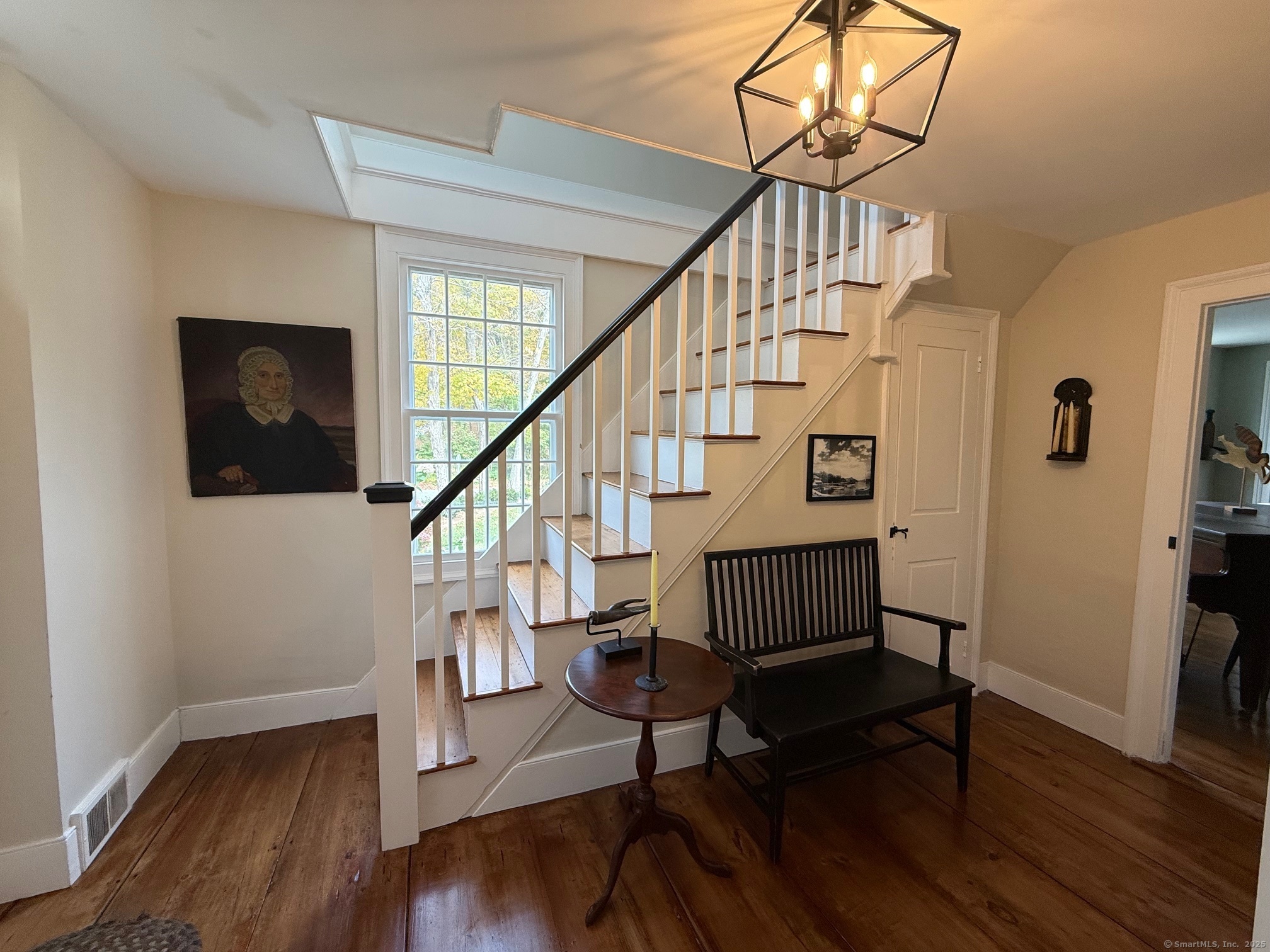 150 Ferry Road, Unit GATEHOUSE Lyme, CT 06371 - Photo 20 of 28 a view of entryway livingroom and hall with wooden floor