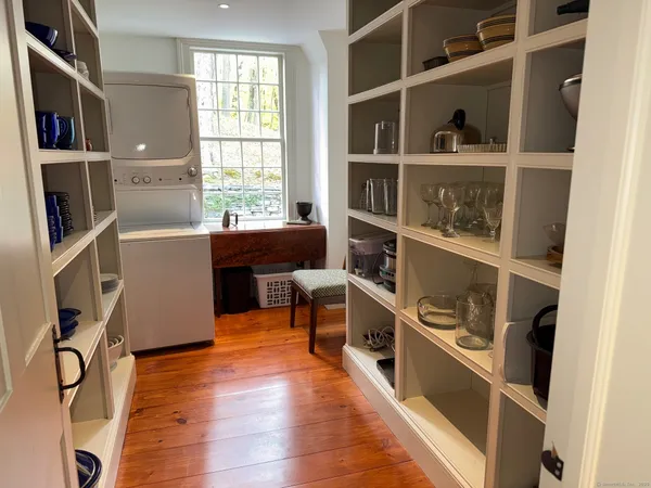 a room with furniture and a window