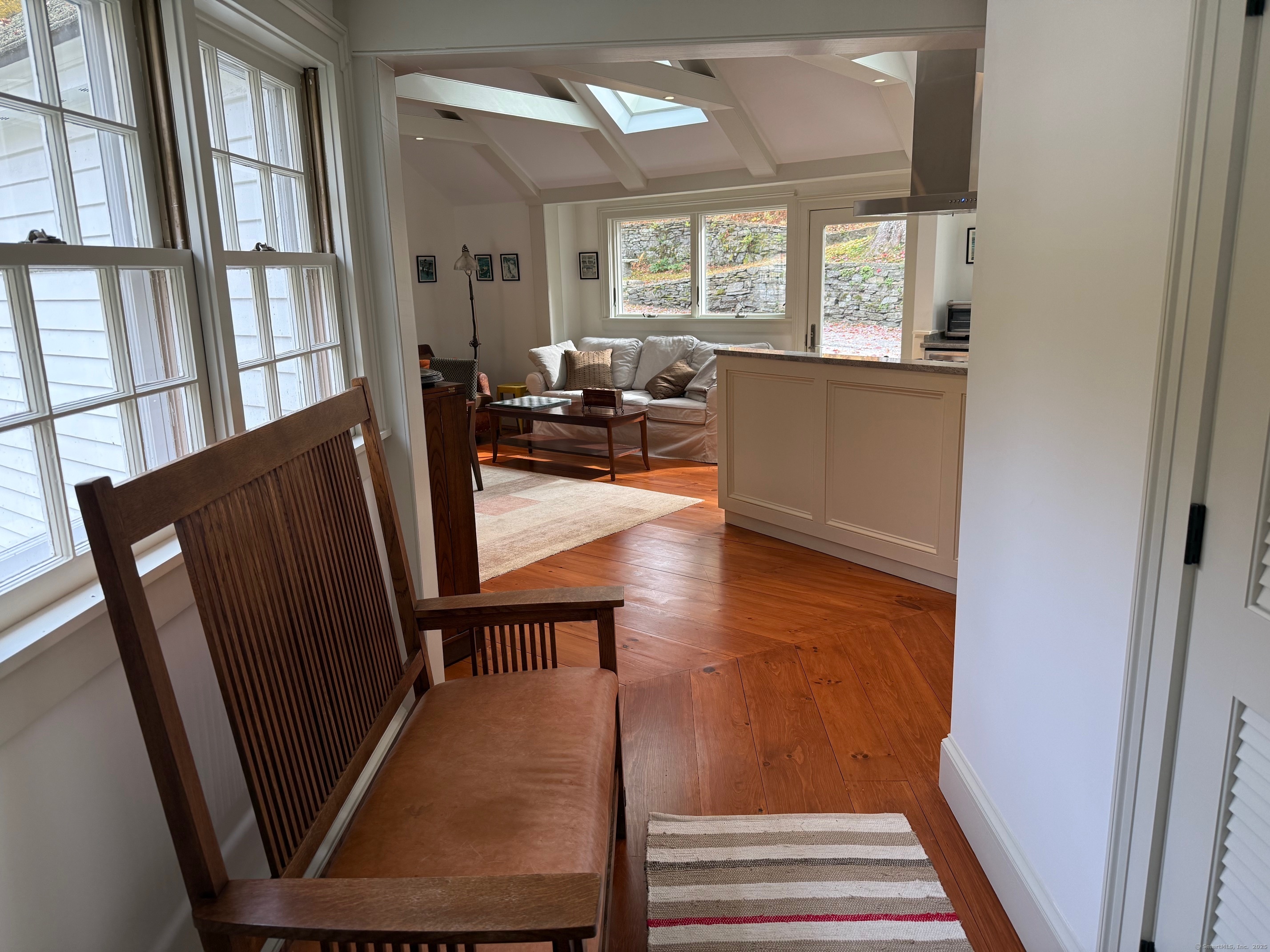 150 Ferry Road, Unit GATEHOUSE Lyme, CT 06371 - Photo 10 of 28 a view of a living room with furniture and a window