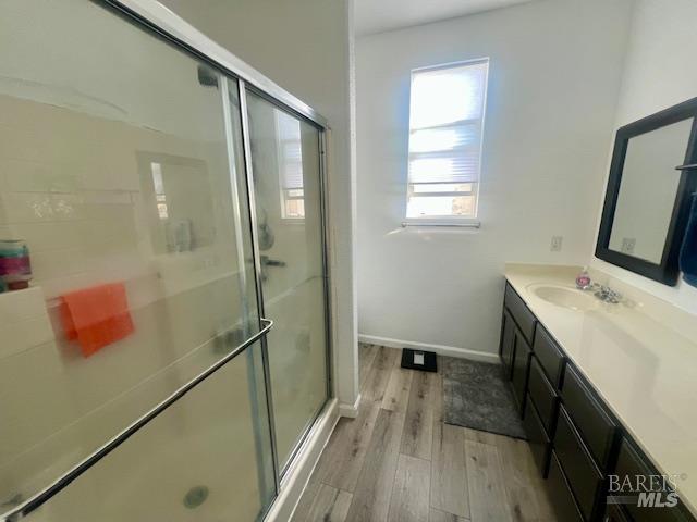 718 Allender Way Rio Vista, CA 94571 - Photo 13 of 25 a bathroom with a sink and a mirror