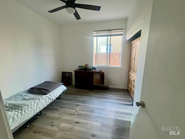 718 Allender Way Rio Vista, CA 94571 - Photo 15 of 25 a bedroom with a bed and window