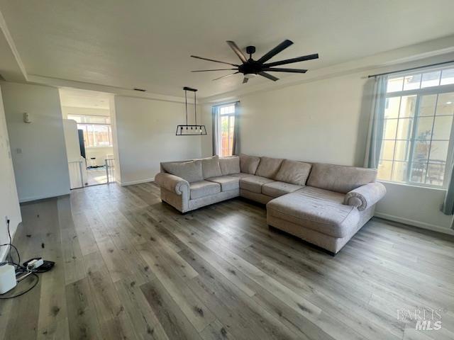 718 Allender Way Rio Vista, CA 94571 - Photo 4 of 25 a living room with furniture and a large window