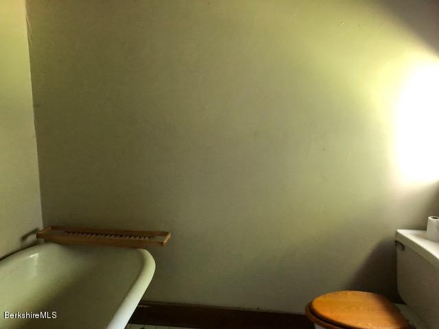 25 Sandisfield Road Sandisfield, MA 01255 - Photo 17 of 32 a bathroom with a toilet and a sink