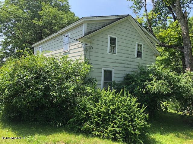 25 Sandisfield Road Sandisfield, MA 01255 - Photo 3 of 32 a view of a house with a yard