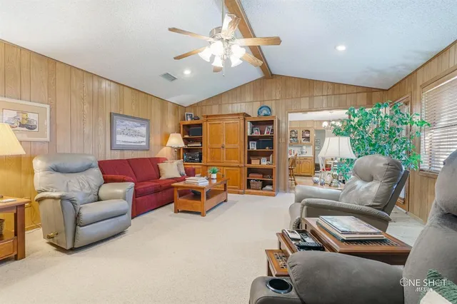 a dining room with a table and chairs