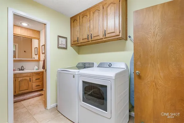 a bed room with bed and tv