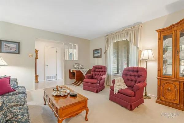 a view of a dining room with furniture