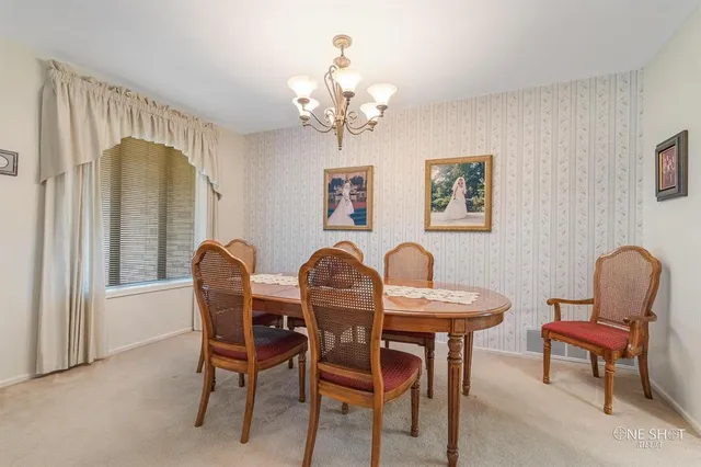 a bathroom with a glass shower door and mirror