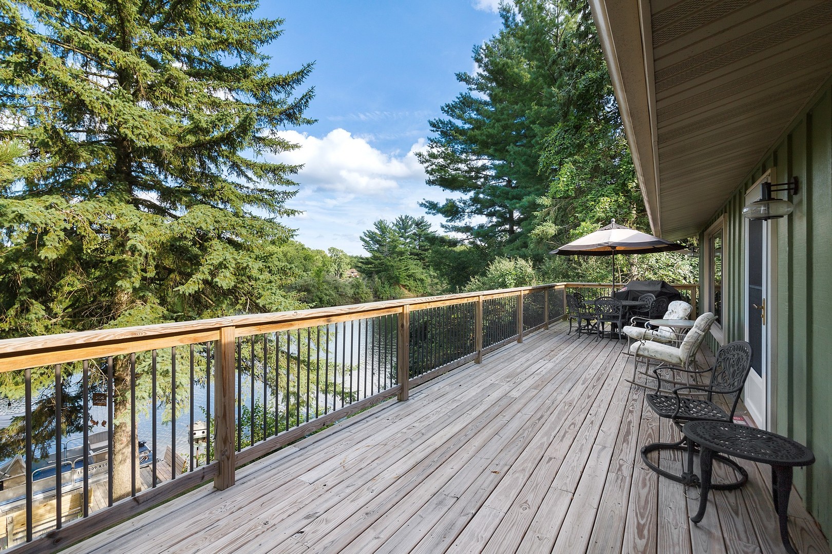 3390 North Jugtown Road Morris, IL 60450 - Photo 27 of 34 a view of a chairs and table on the wooden deck