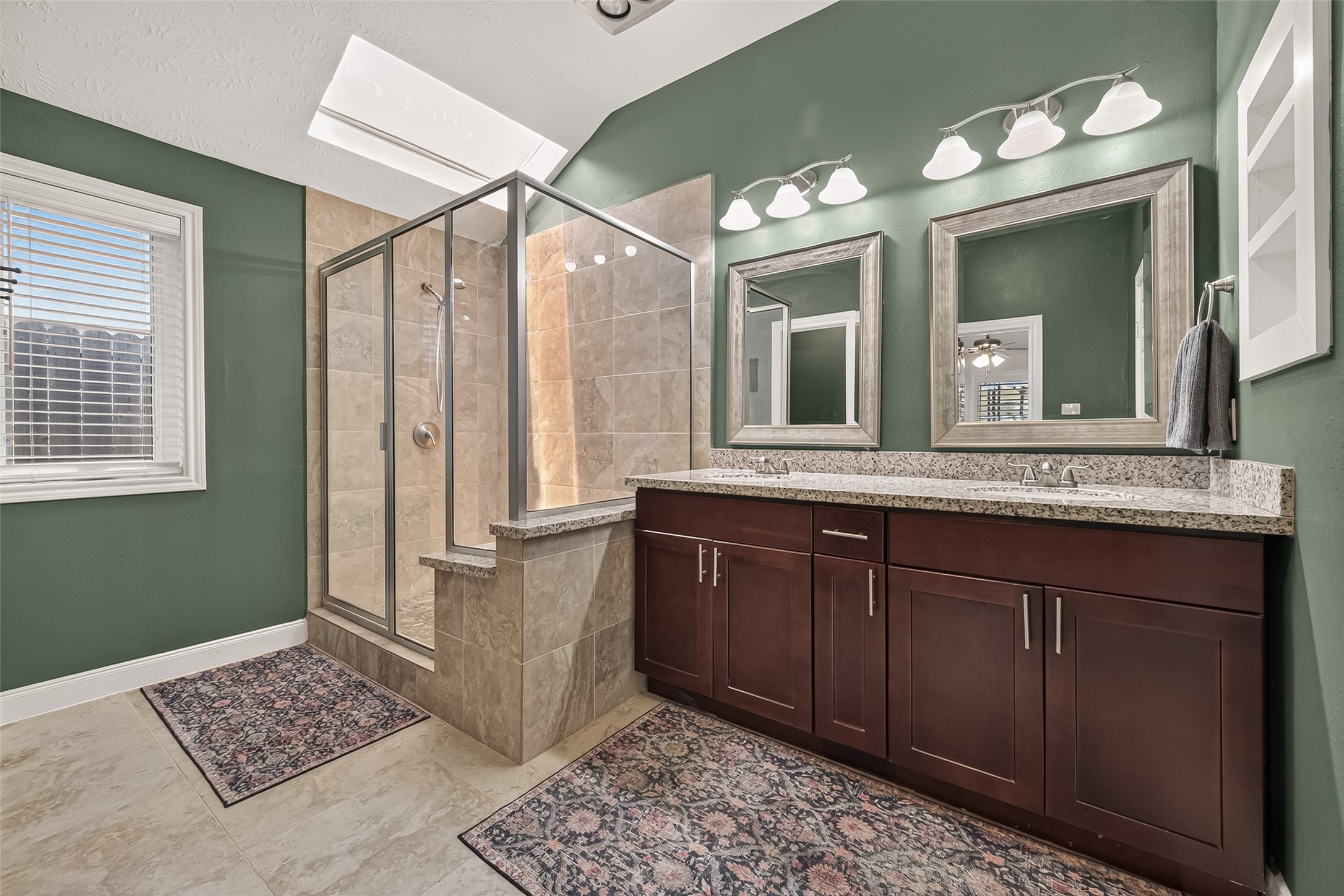 22939 Indian Ridge Drive Katy, TX 77450 - Photo 28 of 35 Primary bathroom with skylight, double sinks, and large shower