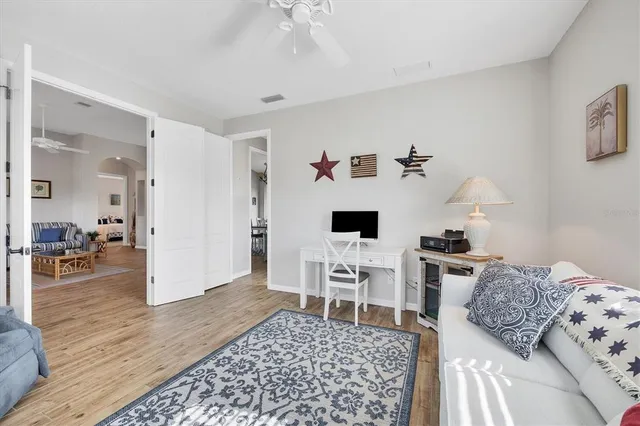 a living room with furniture and a table