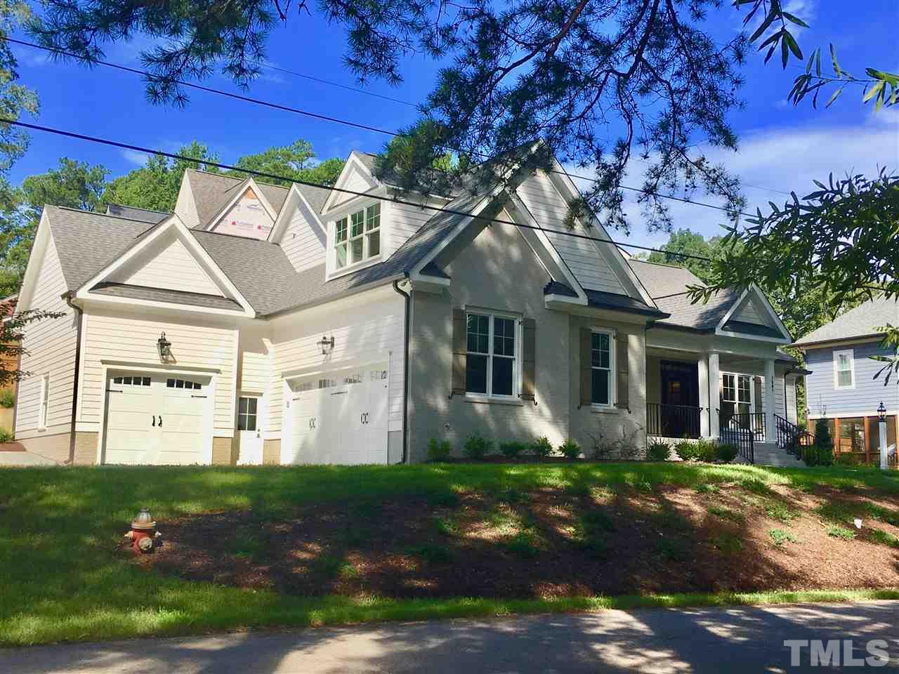1501 Nottingham Road Raleigh, NC 27607 - Photo 2 of 25 a front view of a house with a yard