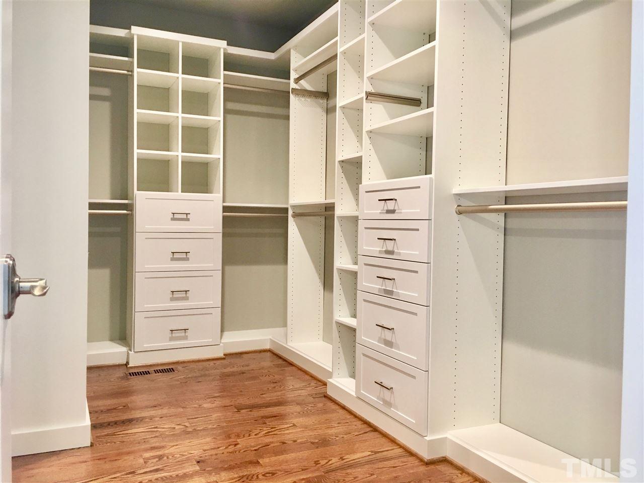 1501 Nottingham Road Raleigh, NC 27607 - Photo 15 of 25 a view of walk in closet with empty racks