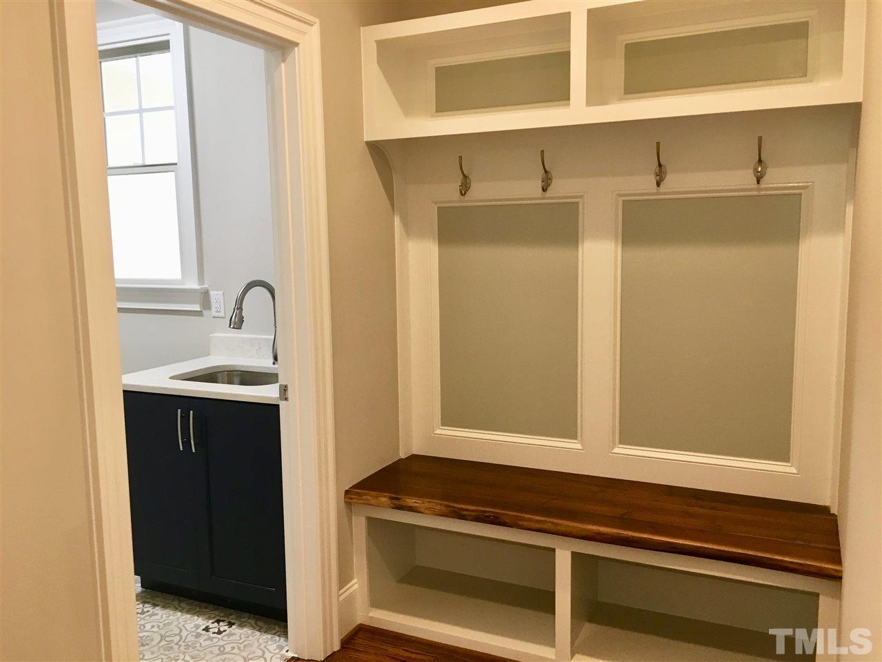 1501 Nottingham Road Raleigh, NC 27607 - Photo 16 of 25 a bathroom with a sink and a mirror