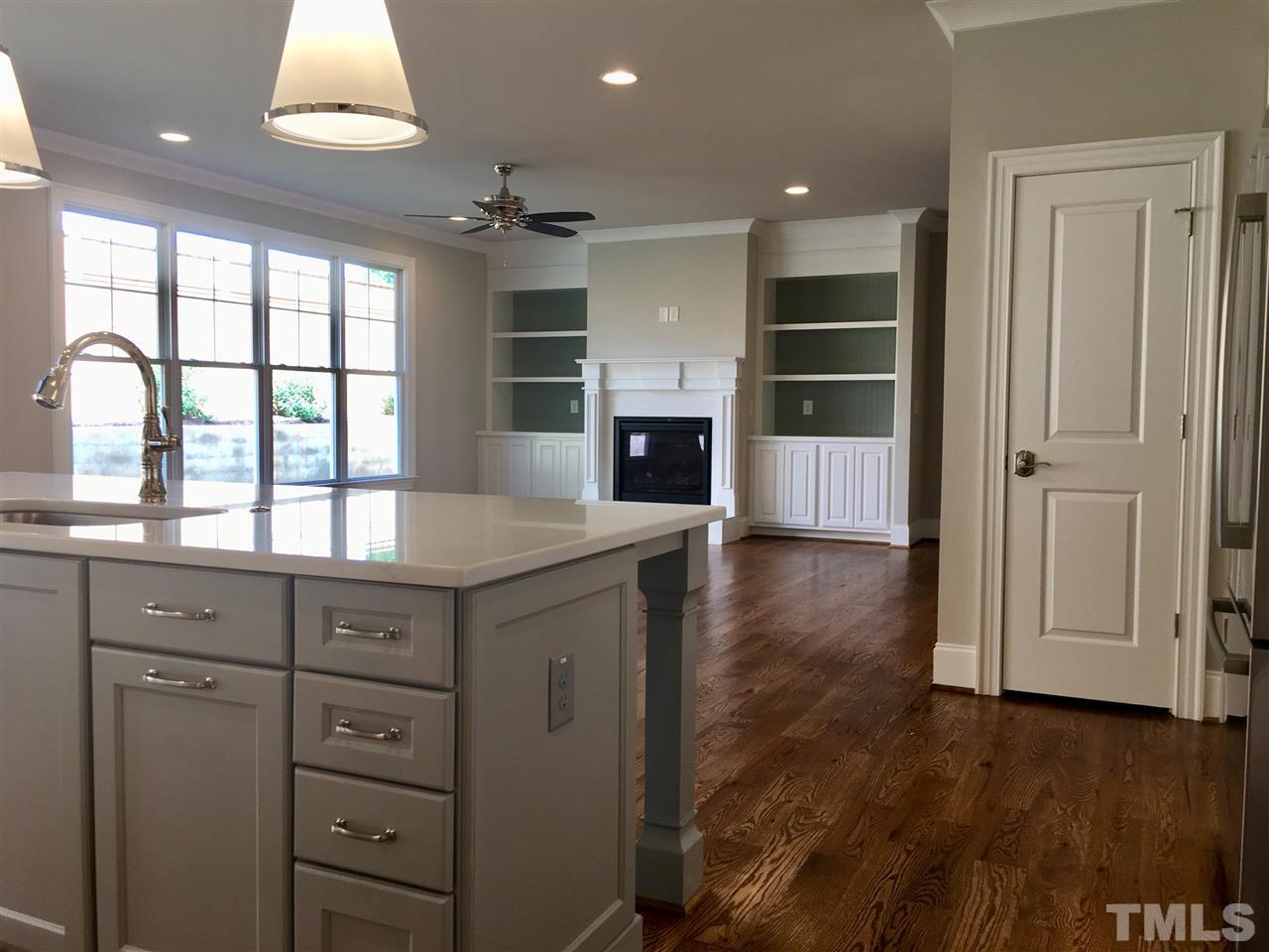 1501 Nottingham Road Raleigh, NC 27607 - Photo 6 of 25 a view of cabinets a wooden floor and a window