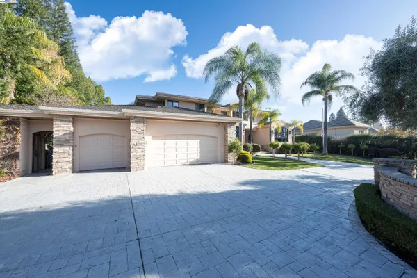 a view of a house with a swimming pool