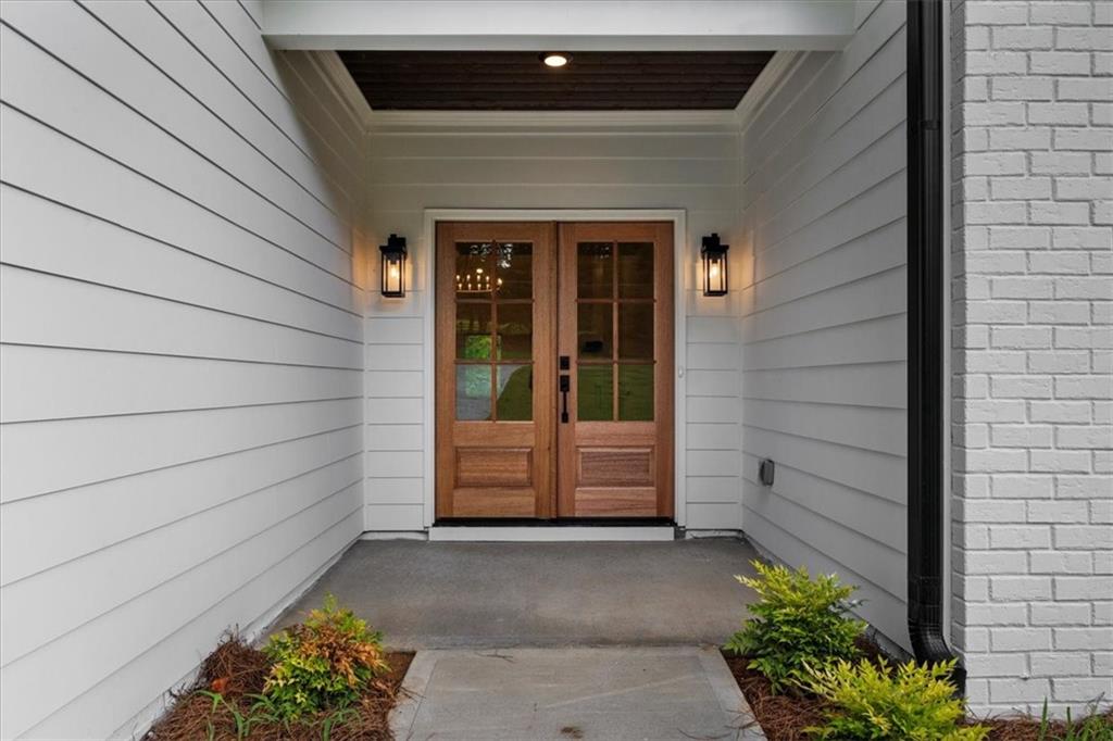 504 Level Creek Road Sugar Hill, GA 30518 - Photo 2 of 54 a view of entrance gate of the house