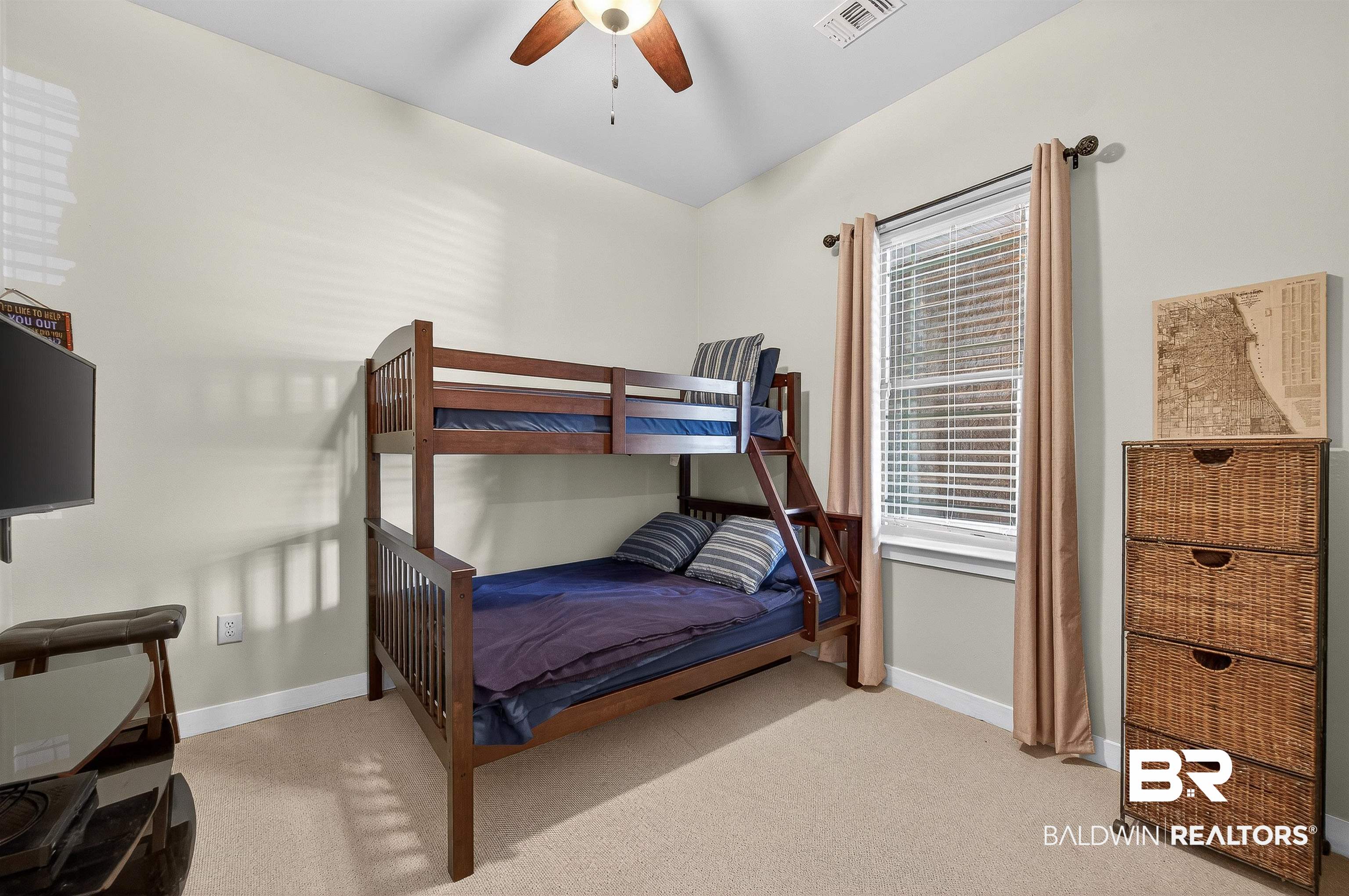 1430 West Regency Road, Unit I102 Gulf Shores, AL 36542 - Photo 20 of 31 Bedroom with Bunk Beds carpet and ceiling fan