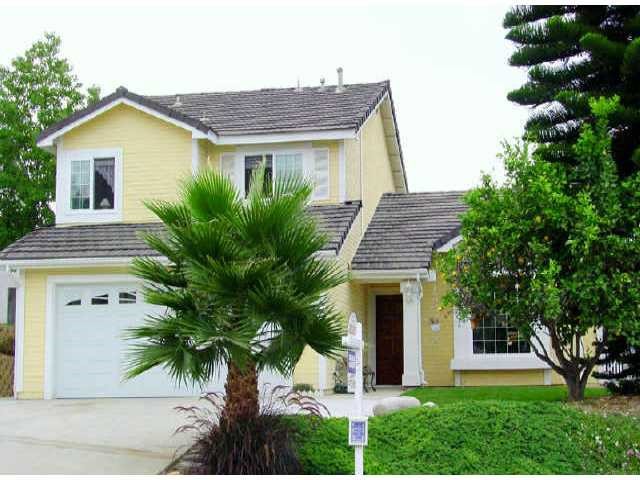 549 Heather Ridge Road San Marcos, CA 92078 - Photo 1 of 1 a front view of a house with garden