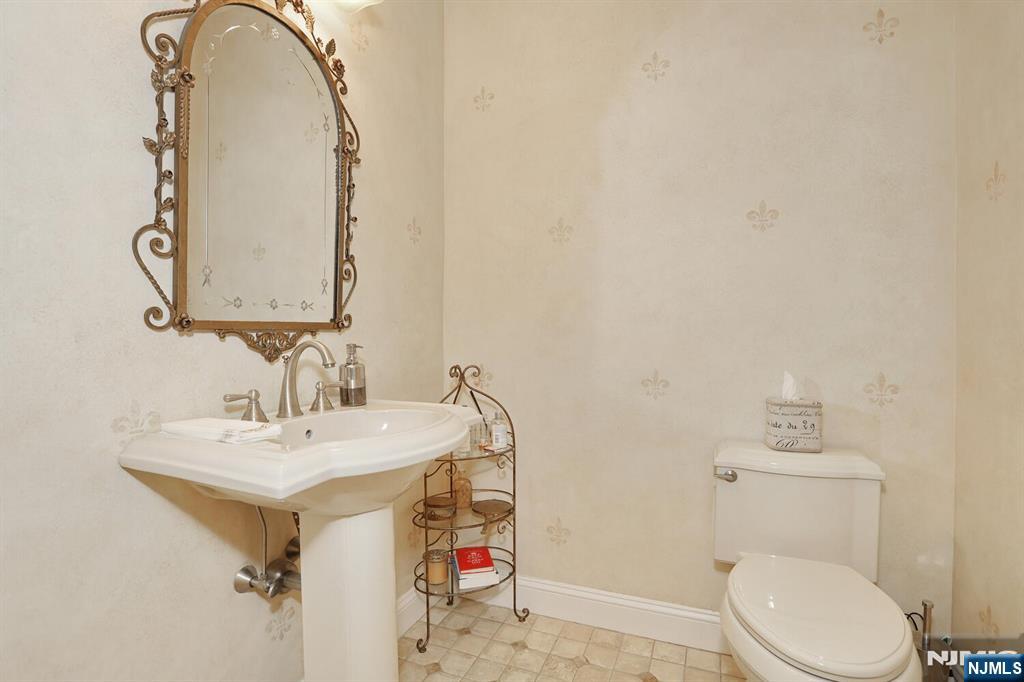 108 Demarest Lane Montvale, NJ 07645 - Photo 8 of 17 a bathroom with a sink mirror vanity and toilet