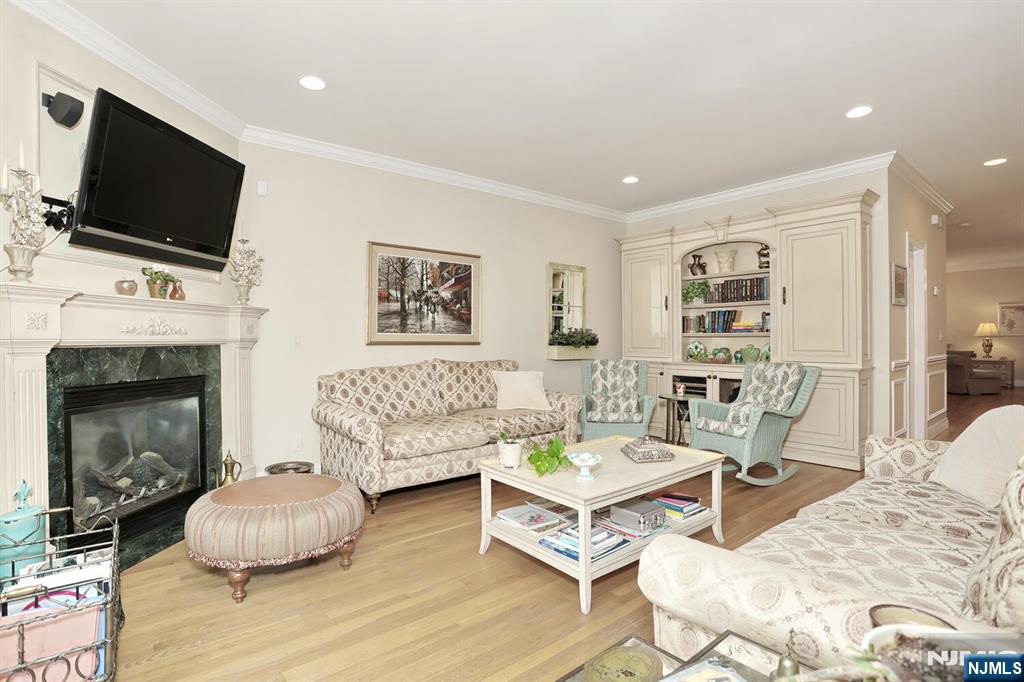 108 Demarest Lane Montvale, NJ 07645 - Photo 9 of 17 a living room with furniture and a flat screen tv