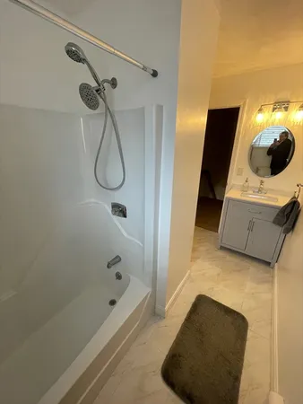 a bathroom with a sink and a tub