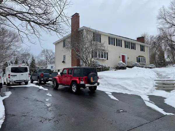 a car parked in front of a building