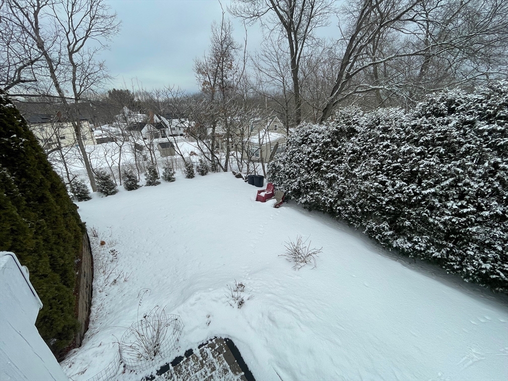 4 Indiana Avenue, Unit 4 Woburn, MA 01801 - Photo 25 of 26 a view of roof covered with snow