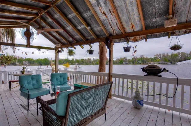 a view of balcony with furniture