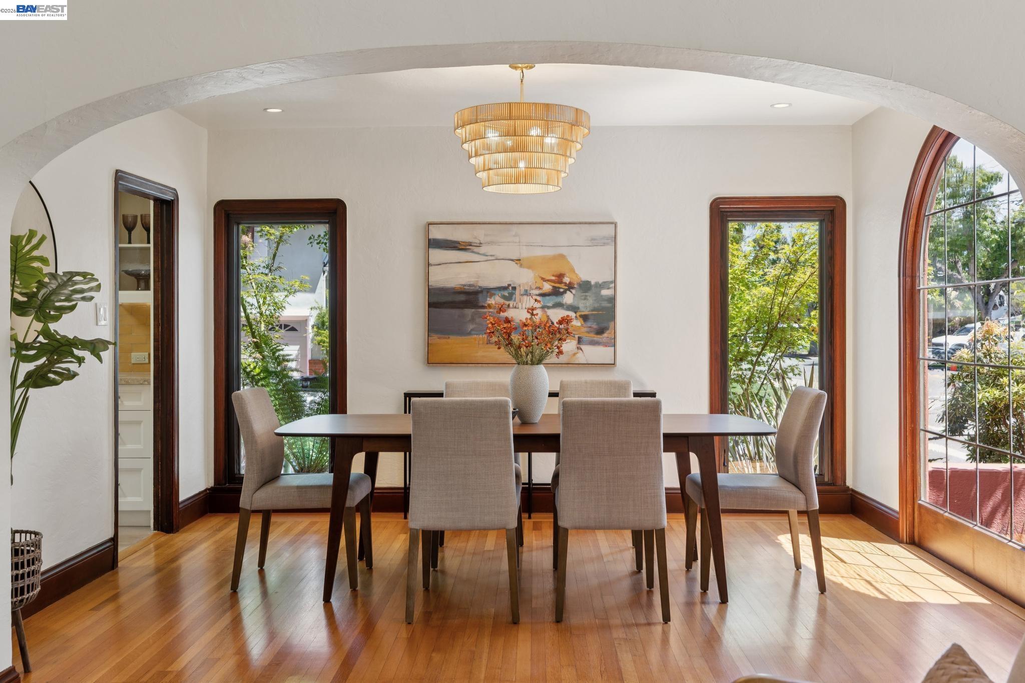 1635 High Street Alameda, CA 94501 - Photo 12 of 56 a view of a dining room with furniture window and wooden floor
