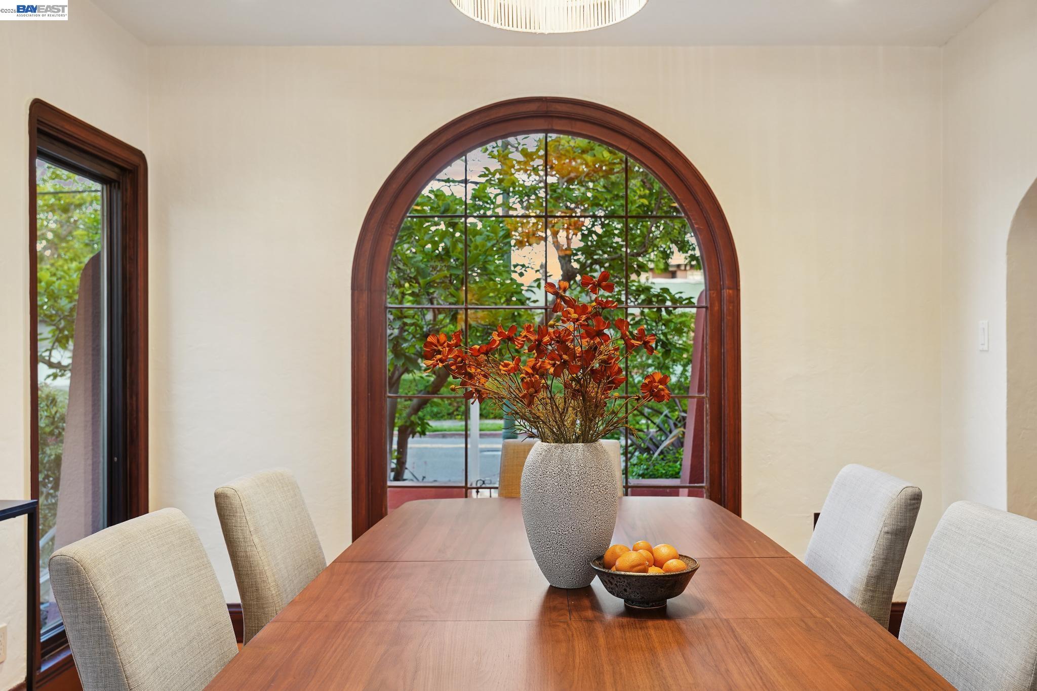 1635 High Street Alameda, CA 94501 - Photo 13 of 56 a view of a dining room with a table and chairs