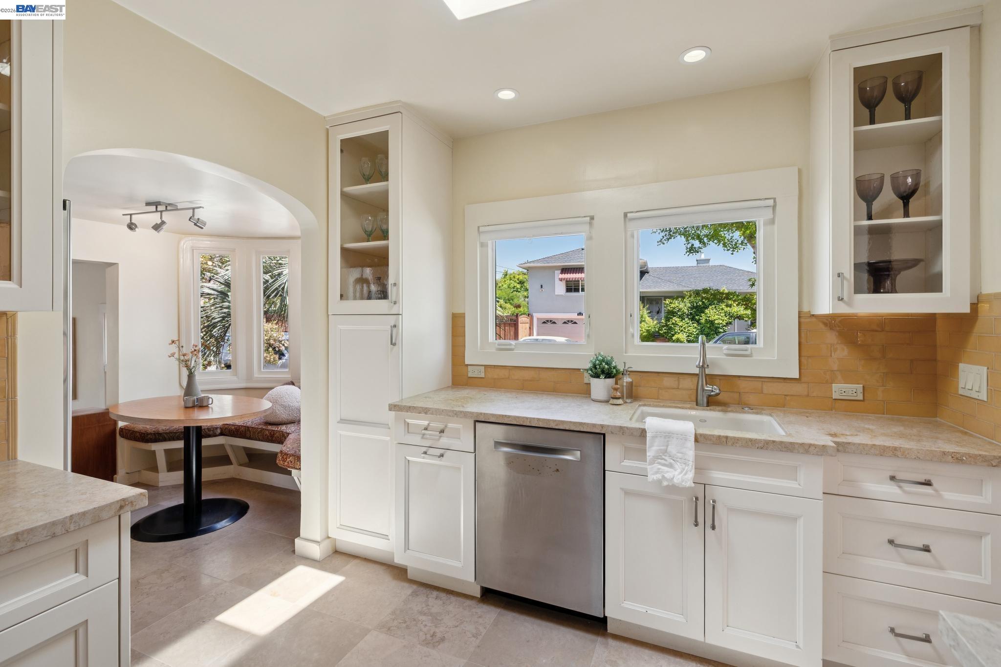 1635 High Street Alameda, CA 94501 - Photo 20 of 56 a kitchen with a sink cabinets and window