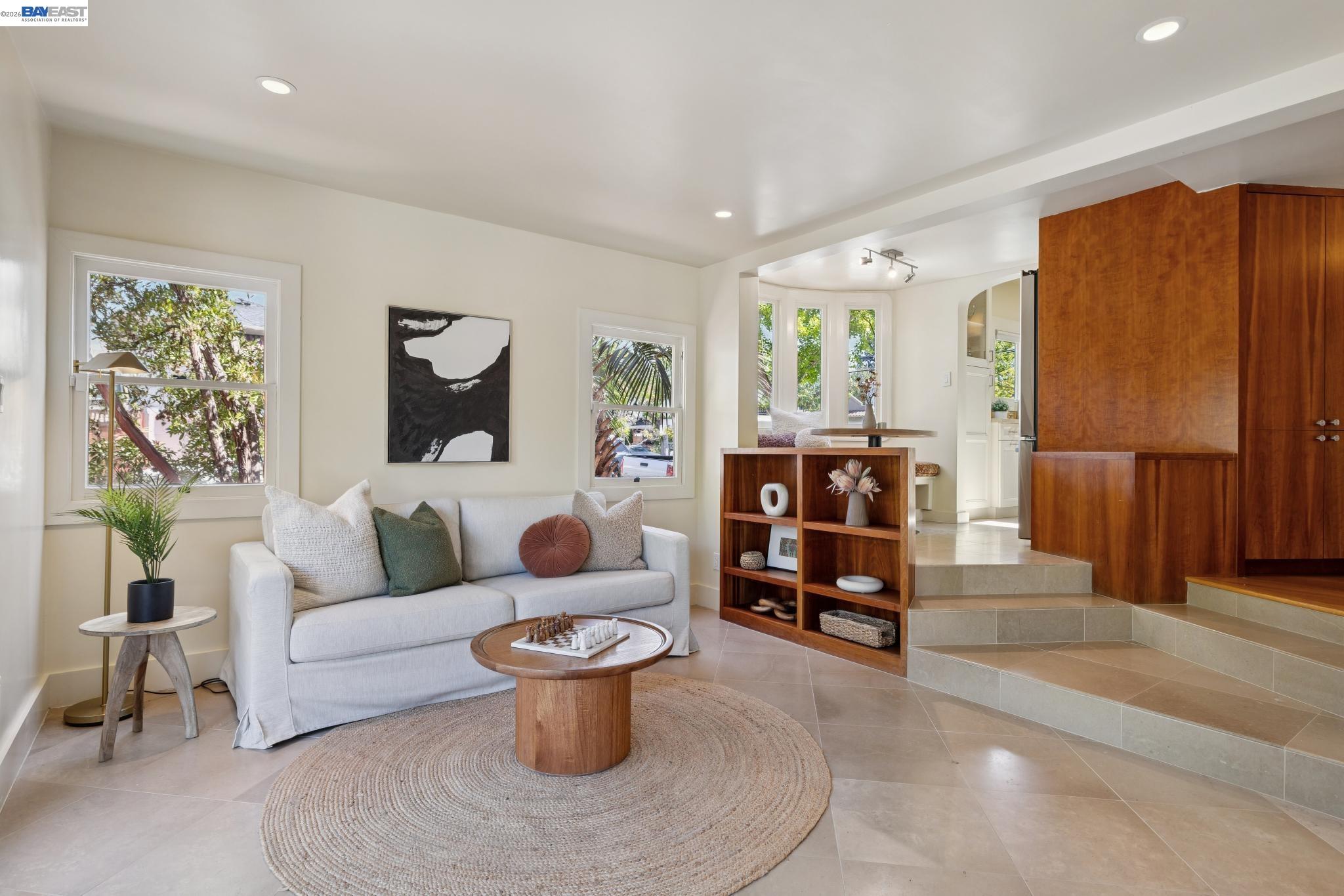 1635 High Street Alameda, CA 94501 - Photo 22 of 56 a living room with furniture a window and a potted plant