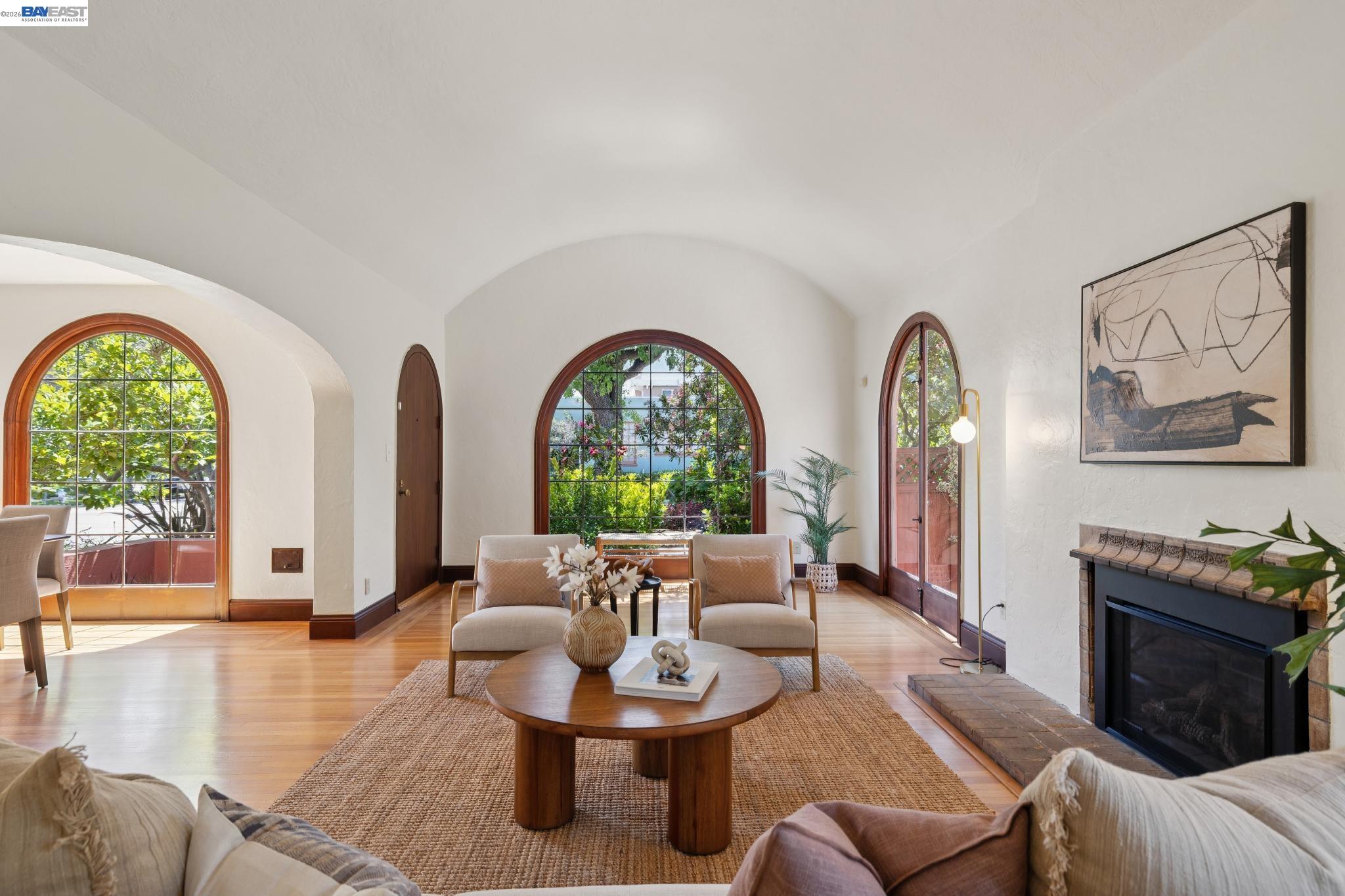 1635 High Street Alameda, CA 94501 - Photo 4 of 56 a living room with fireplace furniture and a large window