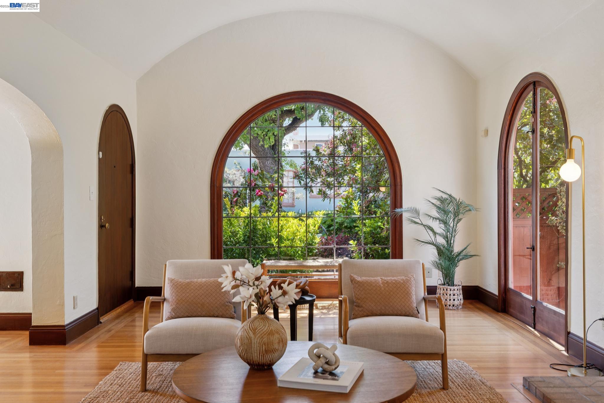 1635 High Street Alameda, CA 94501 - Photo 5 of 56 a living room with furniture and a large window