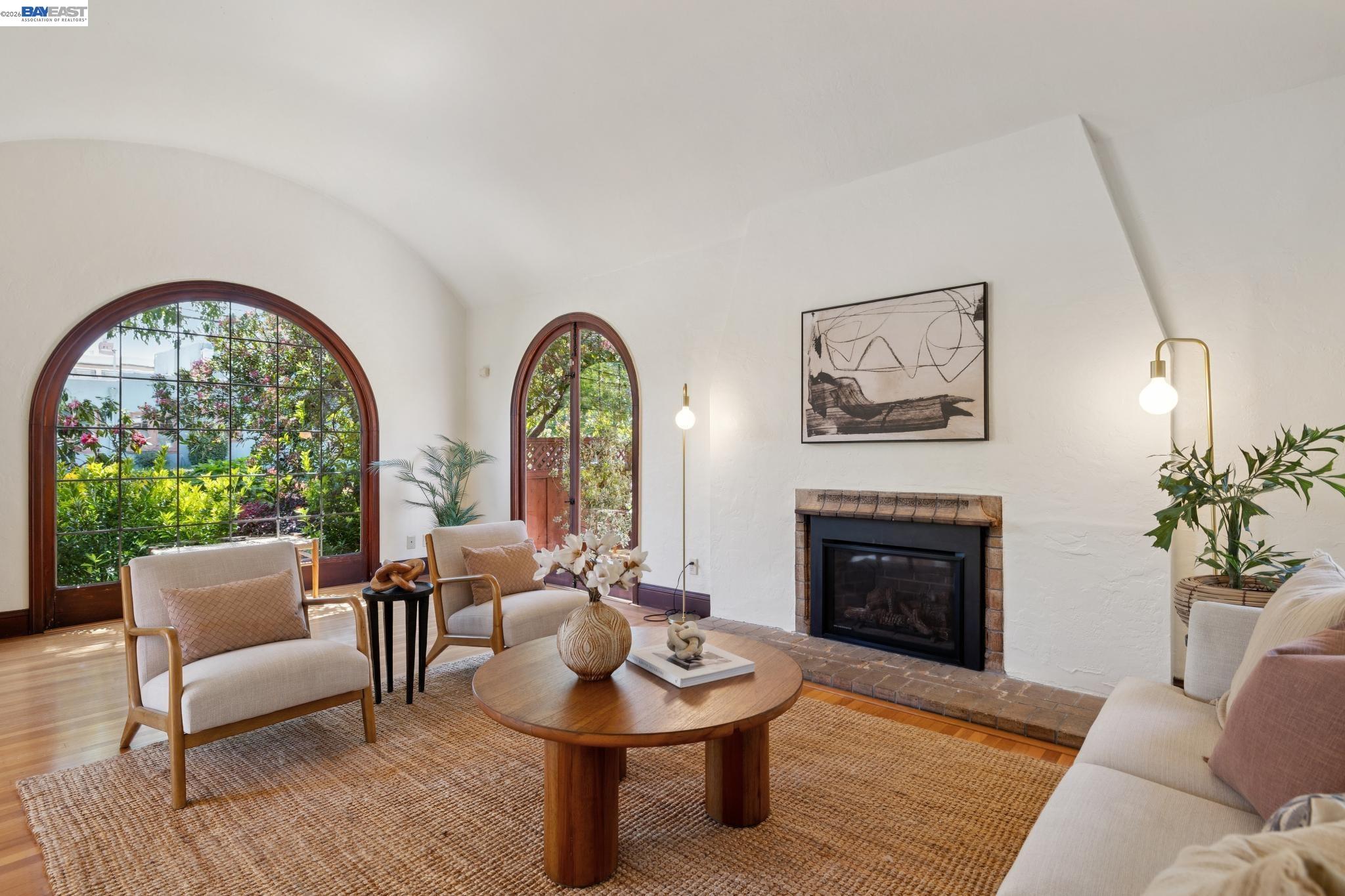 1635 High Street Alameda, CA 94501 - Photo 6 of 56 a living room with furniture a fireplace a potted plant and a fireplace