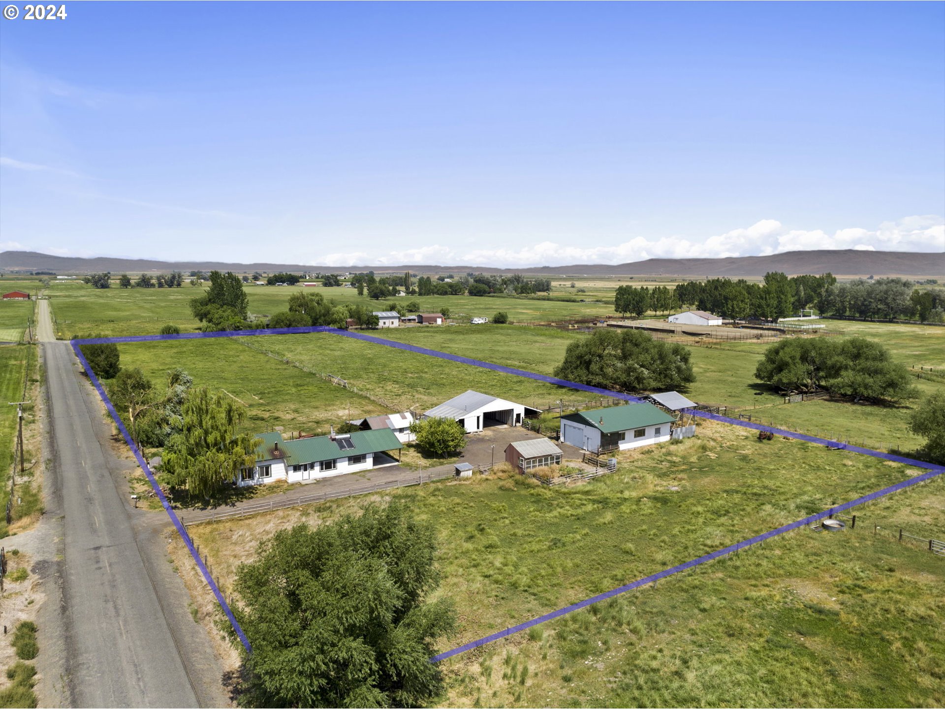 42811 Hudson Road Baker City, OR 97814 - Photo 1 of 46 a view of a lake with a yard
