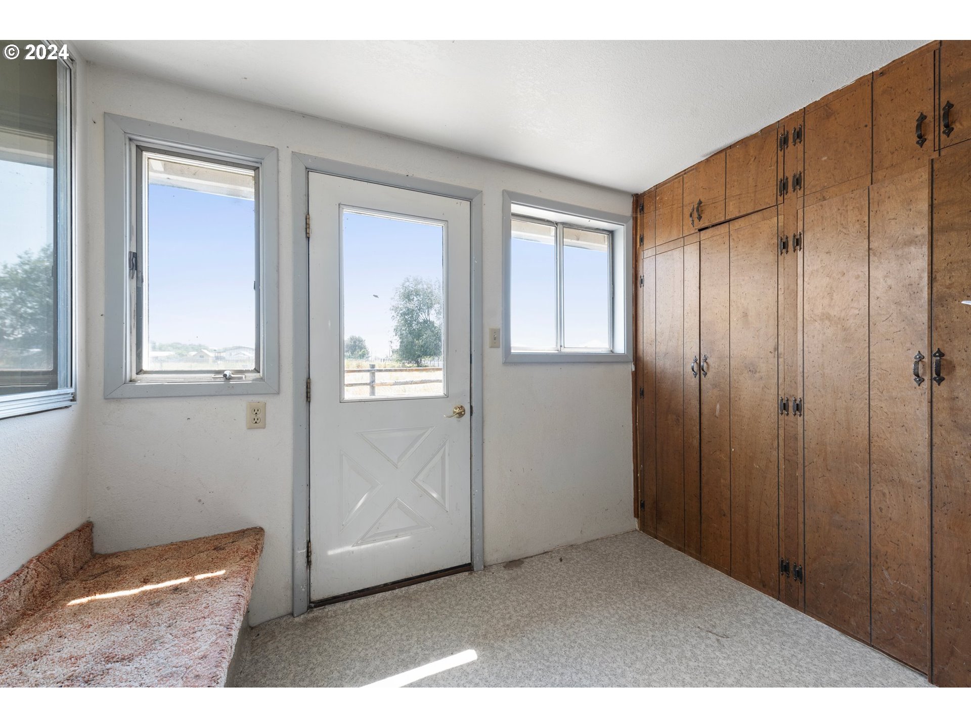 42811 Hudson Road Baker City, OR 97814 - Photo 20 of 46 a view of an empty room with windows and closet