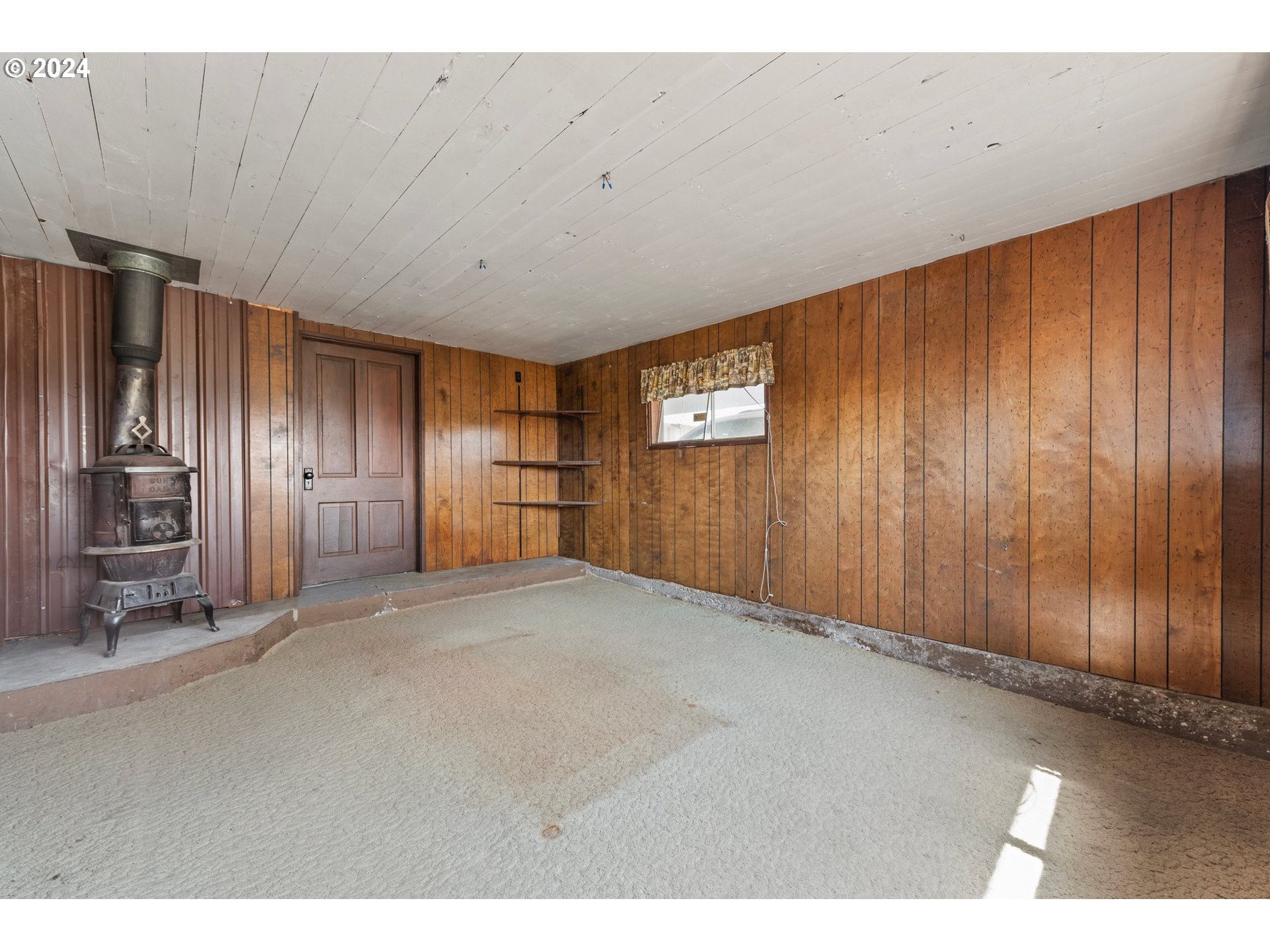 42811 Hudson Road Baker City, OR 97814 - Photo 23 of 46 a view of an empty room with wooden floor