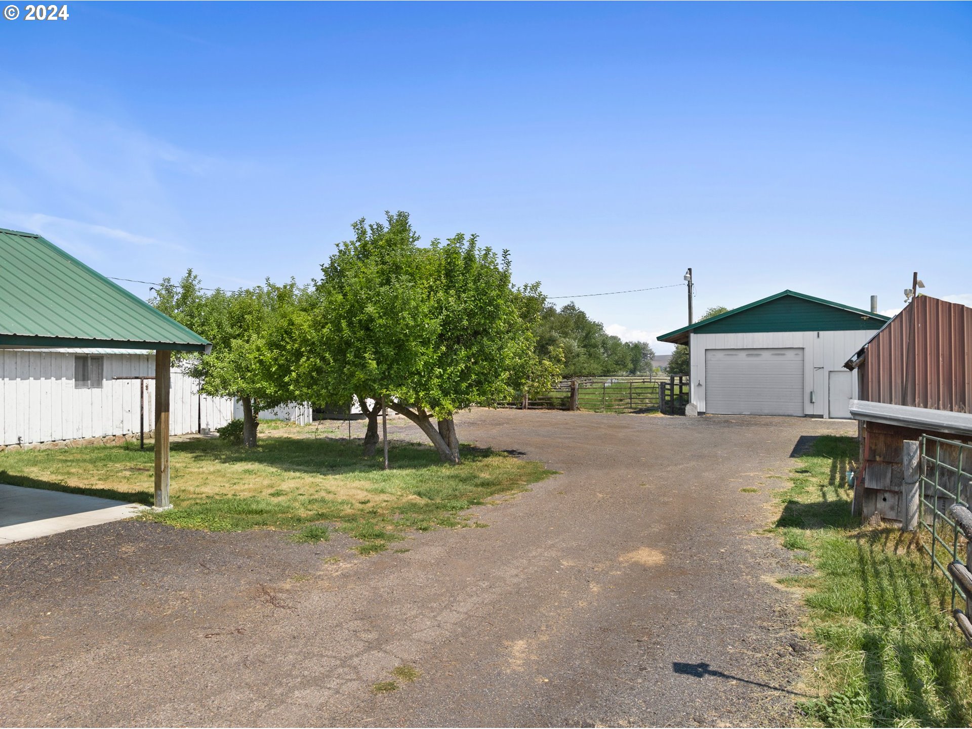 42811 Hudson Road Baker City, OR 97814 - Photo 29 of 46 a house with trees in front of it