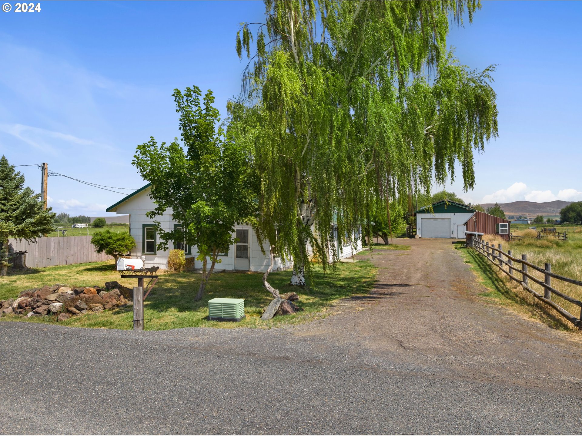 42811 Hudson Road Baker City, OR 97814 - Photo 4 of 46 a view of backyard with swimming pool and seating area