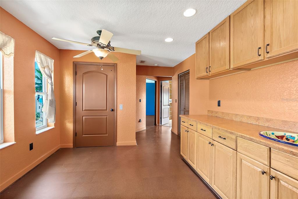 54 Ocean Street Palm Coast, FL 32137 - Photo 11 of 90 a view of a kitchen with stainless steel appliances granite countertop a refrigerator and a stove top oven