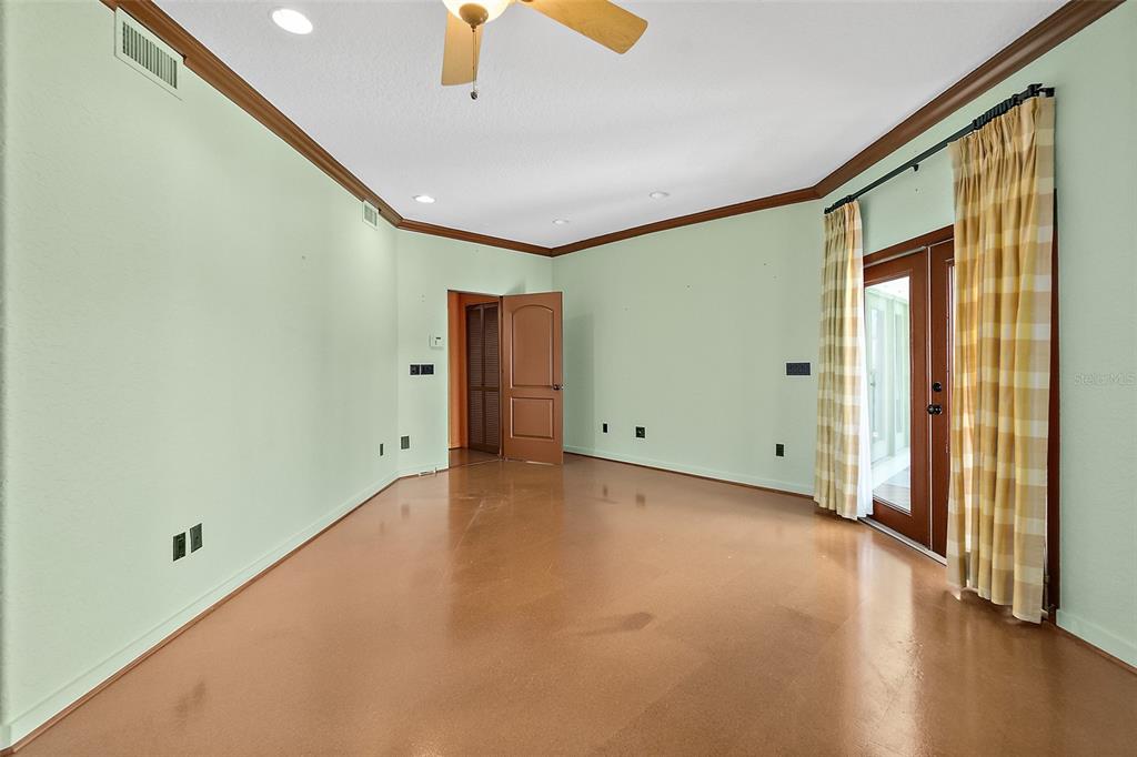 54 Ocean Street Palm Coast, FL 32137 - Photo 30 of 90 a view of a room with wooden floor and windows