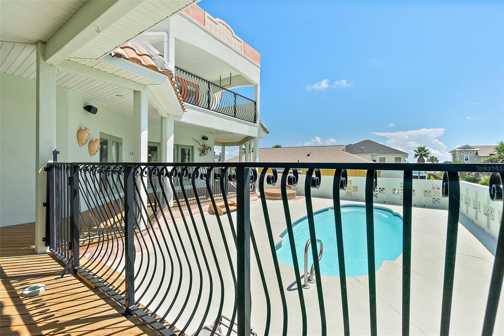 54 Ocean Street Palm Coast, FL 32137 - Photo 4 of 90 a view of a balcony with wooden floor