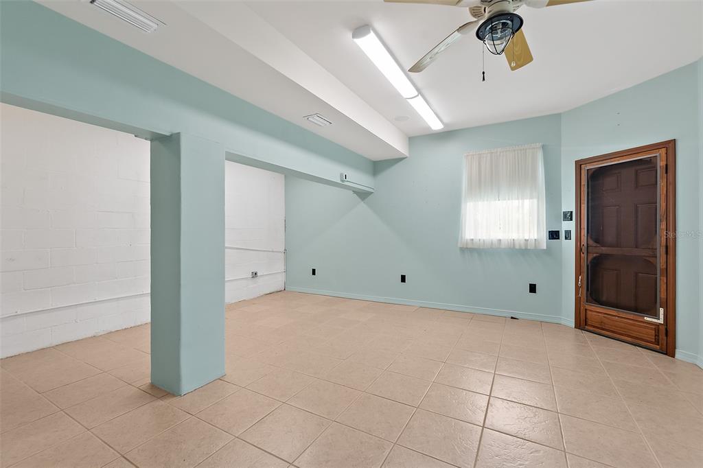 54 Ocean Street Palm Coast, FL 32137 - Photo 59 of 90 a view of an empty room with a window
