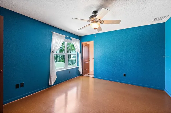 a view of a swimming pool with an outdoor seating and yard